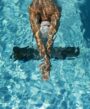high-angle-male-swimmer-water-pool-scale