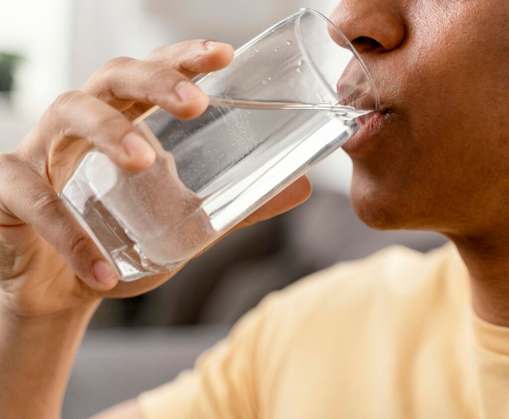 a man drinking water